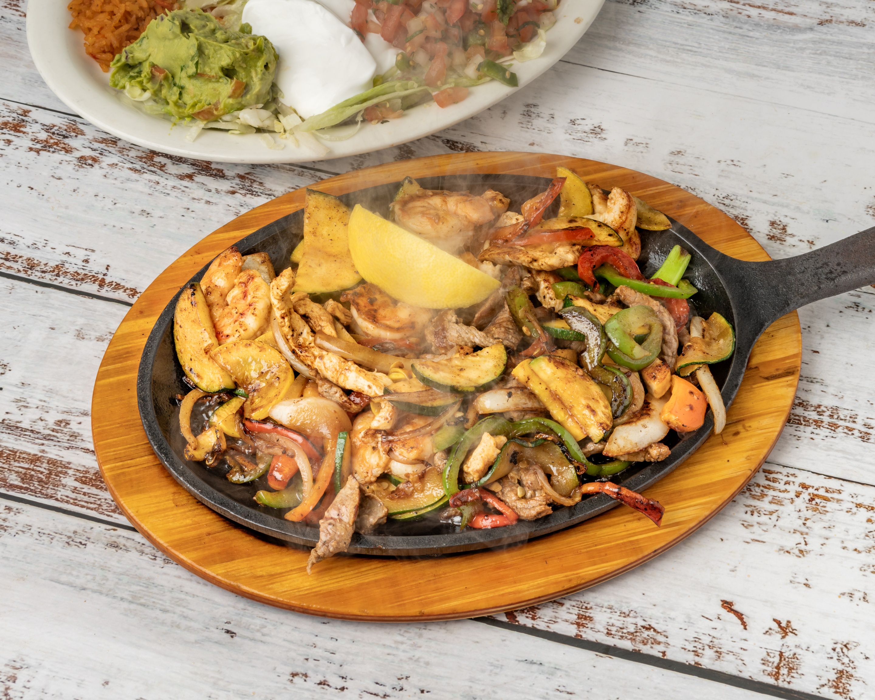 Fajitas Supremas — steak, chicken & shrimp